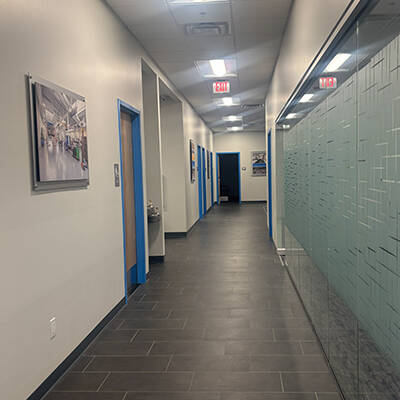 Digital Print on Aluminum with Standoffs Vinyl Glass Graphics - Weil Construction